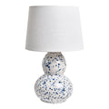 Lampe design en céramique blanche à motifs bleus